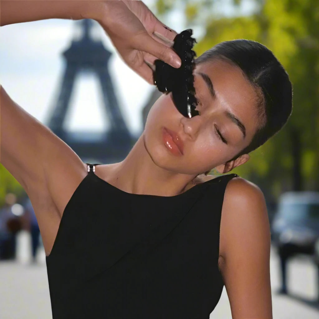 a girl in Paris with a hair claw