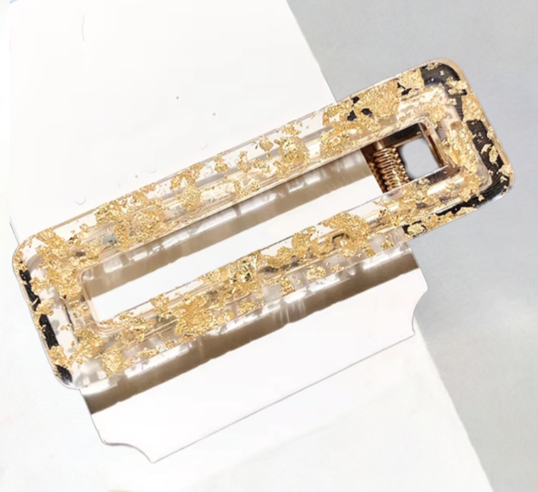 A gold hair clip