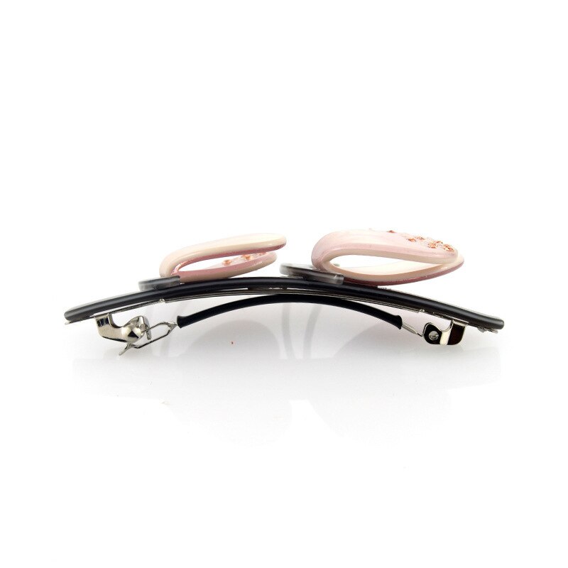 Beautiful hair barrette in double butterfly style.   Set a glamorous tone with this hair barrette clips in pink and beige.  Material: Eco-friendly/Recyclable Acetate