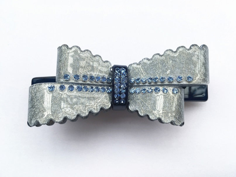 Gorgeous new arrival French rhinestone bow barrettes  Double leaf bow with rhinestone crystal detail. Perfect for daily life, parties, gifts and formal events    Size: 8.2cm x 3.2cm    Material: Acrylic acetate (eco-friendly/recyclable) & zinc alloy clip