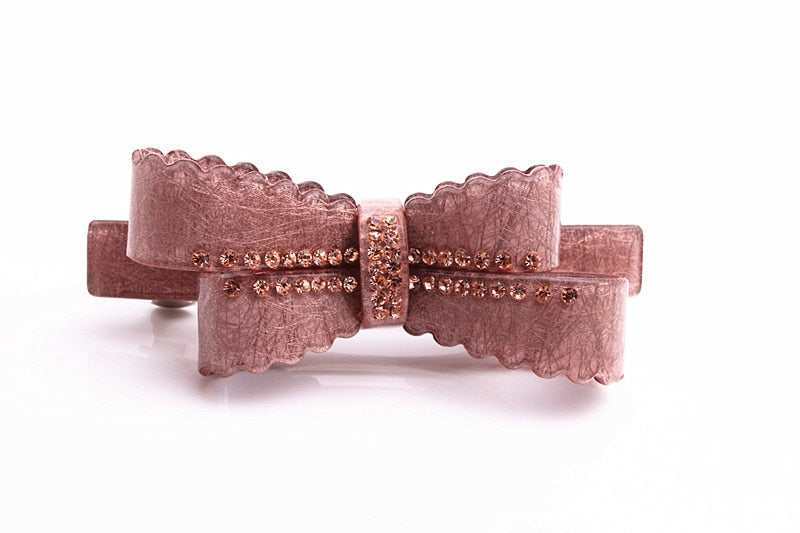 Gorgeous new arrival French rhinestone bow barrettes  Double leaf bow with rhinestone crystal detail. Perfect for daily life, parties, gifts and formal events    Size: 8.2cm x 3.2cm    Material: Acrylic acetate (eco-friendly/recyclable) & zinc alloy clip