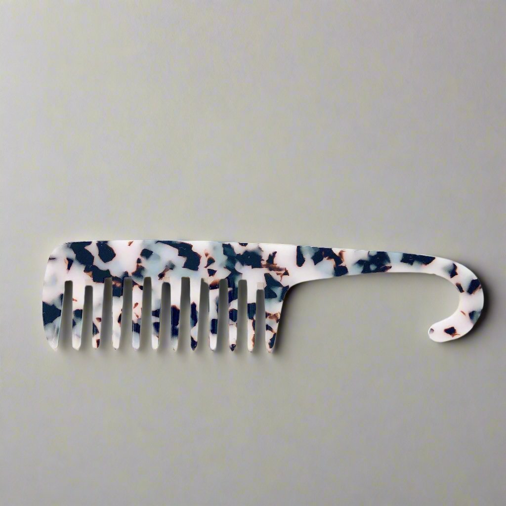 Wide tooth combs for use the bath and shower. These combs help to protect your hair and reduce damage to the strands when removing knots and tangles or working through hair conditioner