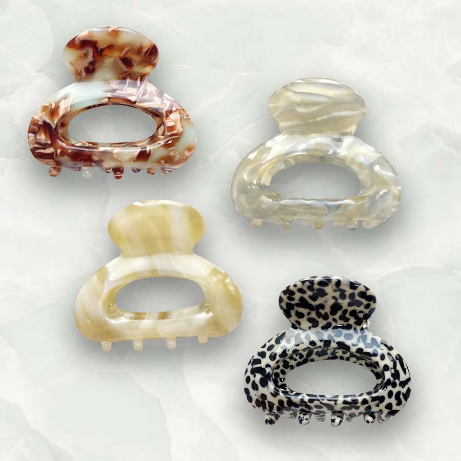 Mini claw clips are the trendiest hair accessory of 2022. These cute claw grips are the best way to get into this trend and match this seasons colours. An essential beauty tool to keep hair away from your face and add easy style to any look.