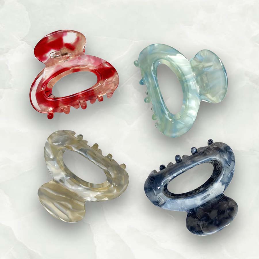 Mini claw clips are the trendiest hair accessory of 2022. These cute claw grips are the best way to get into this trend and match this seasons colours. An essential beauty tool to keep hair away from your face and add easy style to any look.